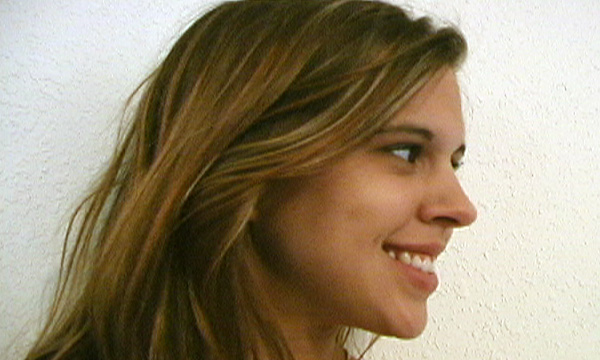 Ariel Andrews smiles while modeling